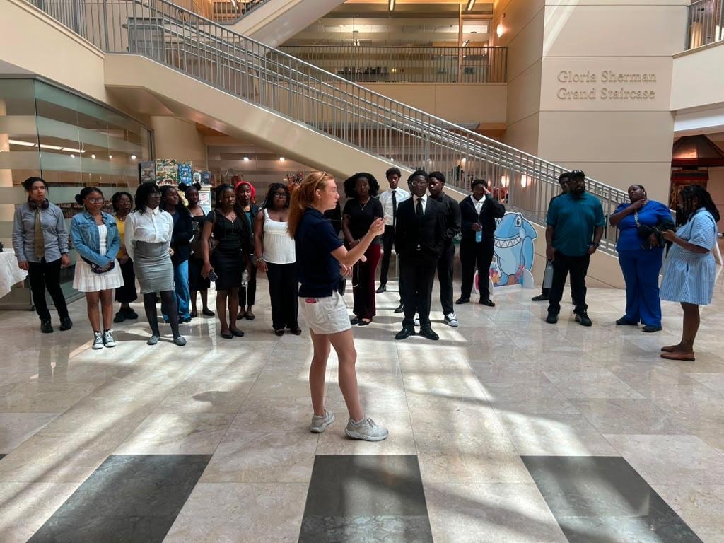 Students in the Gloria Sherman Grand Staircase atrium at NSU